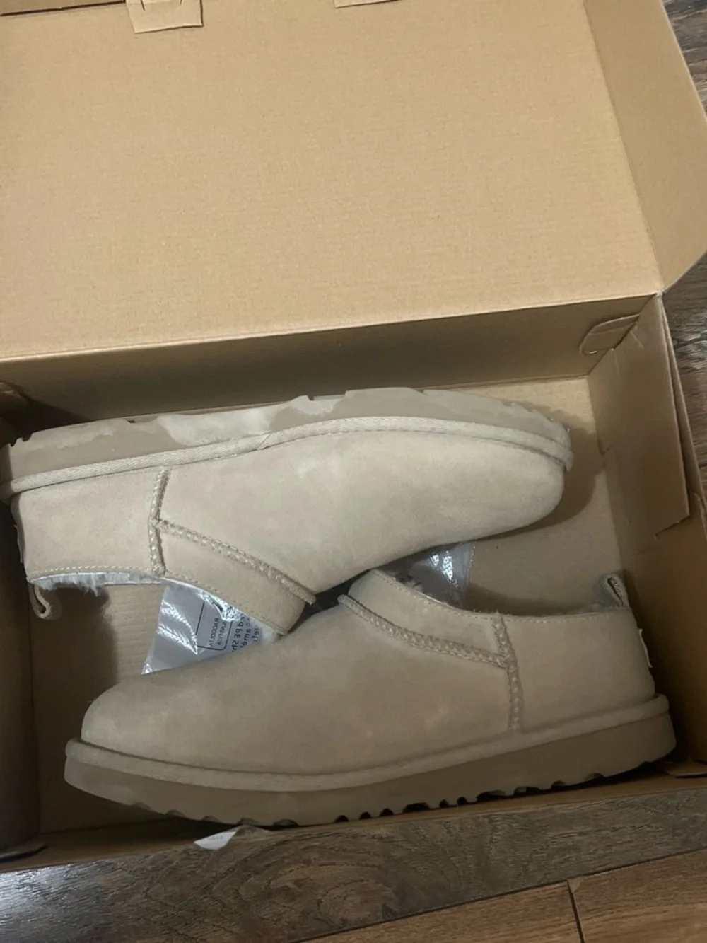 UGG Kids Slip-On Shearling-Lined Slippers in Sand